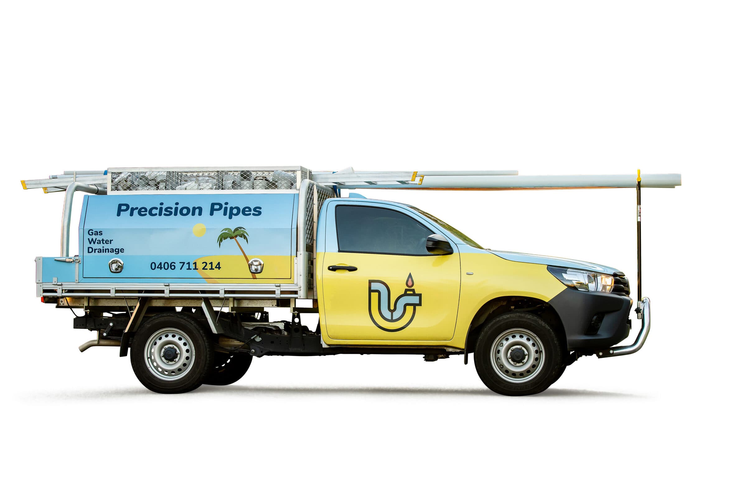 The signwritten Precision Pipes ute parked outside a Hills District home